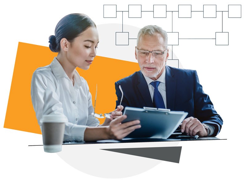 Man and woman reviewing paperwork together